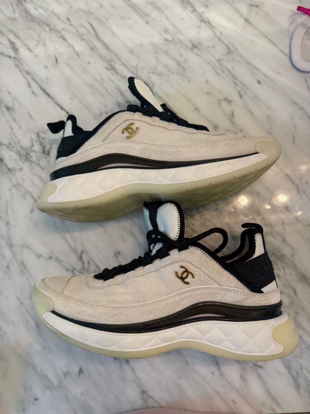 CHANEL Beige and Black Suede Low-Top Sneakers with Gold CC Accent